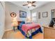 Cozy bedroom with a double bed and wood furniture at 3242 Bailey Ann Dr, Ormond Beach, FL 32174