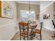 Small dining area with a round table and four chairs at 3242 Bailey Ann Dr, Ormond Beach, FL 32174