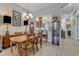 Bright dining room with wood table and chairs, showcasing an open floor plan at 3242 Bailey Ann Dr, Ormond Beach, FL 32174