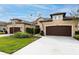 Two attached houses with brown garage doors and green lawns at 3242 Bailey Ann Dr, Ormond Beach, FL 32174