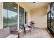 Relaxing screened lanai with patio furniture and backyard view at 3242 Bailey Ann Dr, Ormond Beach, FL 32174