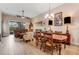 Living and dining room with hardwood floors and neutral decor at 3242 Bailey Ann Dr, Ormond Beach, FL 32174