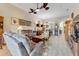 Spacious living room with ample seating and view into dining area at 3242 Bailey Ann Dr, Ormond Beach, FL 32174