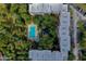 Aerial view of building with pool and parking at 640 N Nova Rd # 212, Ormond Beach, FL 32174