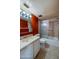Bathroom with tub, vanity, and a large mirror at 640 N Nova Rd # 212, Ormond Beach, FL 32174