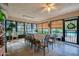 Community room with tables and chairs, pool view at 640 N Nova Rd # 212, Ormond Beach, FL 32174