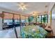 Relaxing community room with seating and large windows at 640 N Nova Rd # 212, Ormond Beach, FL 32174