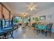 Relaxing community room with seating and tables at 640 N Nova Rd # 212, Ormond Beach, FL 32174