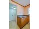Additional kitchen counter space with wood cabinets and granite top at 640 N Nova Rd # 212, Ormond Beach, FL 32174