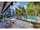 Community patio area with a view of the pool at 640 N Nova Rd # 212, Ormond Beach, FL 32174