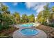 Community pool and spa with ample lounge space at 640 N Nova Rd # 212, Ormond Beach, FL 32174
