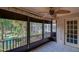Bright screened patio with view of lush landscaping at 640 N Nova Rd # 212, Ormond Beach, FL 32174