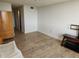 Spacious bedroom with hardwood flooring, ample natural light, and closet storage at 935 N Halifax Ave # 602, Daytona Beach, FL 32118