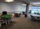 Cozy card room featuring multiple game tables and chairs, creating a welcoming space for social activities at 935 N Halifax Ave # 602, Daytona Beach, FL 32118