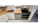 Stylish kitchen featuring stainless steel appliances, a new oven, and ample counter space at 935 N Halifax Ave # 602, Daytona Beach, FL 32118