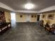 Lobby area featuring tiled floors, accent furniture and decorative art at 935 N Halifax Ave # 602, Daytona Beach, FL 32118
