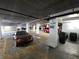 Parking garage for residents and guests with painted lines at 935 N Halifax Ave # 602, Daytona Beach, FL 32118