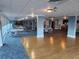 Spacious recreation room featuring tables, chairs, and a dance floor for community events and social gatherings at 935 N Halifax Ave # 602, Daytona Beach, FL 32118