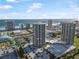 Aerial view of building, pool, parking and ocean at 1 Oceans West Blvd # 16A4, Daytona Beach, FL 32118