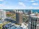 Aerial view of a luxury high-rise condo building with ocean views and resort-style amenities at 1 Oceans West Blvd # 16A4, Daytona Beach, FL 32118