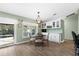 Casual breakfast nook with table and chairs overlooking the pool at 10 Ocean Pines Dr, Ormond Beach, FL 32174