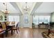 Bright dining room with hardwood floors and a formal dining table at 10 Ocean Pines Dr, Ormond Beach, FL 32174