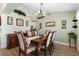 Elegant dining room, featuring a large table and sideboard at 10 Ocean Pines Dr, Ormond Beach, FL 32174