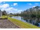 Peaceful backyard scene with a lake view at 10 Ocean Pines Dr, Ormond Beach, FL 32174