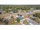 Aerial view of property showing home, pool, and neighborhood at 1102 Rolling Acres Dr, Deland, FL 32720