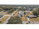 Aerial view of home, pool, and surrounding neighborhood context at 1102 Rolling Acres Dr, Deland, FL 32720