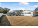 Large backyard with fenced enclosure and pool at 1102 Rolling Acres Dr, Deland, FL 32720