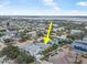 Aerial view showing the house's location in a residential neighborhood near the water at 137 Avalon Dr, Ormond Beach, FL 32176