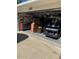 Garage with golf cart and storage shelving at 137 Avalon Dr, Ormond Beach, FL 32176