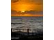 Stunning ocean sunset over the water at 137 Avalon Dr, Ormond Beach, FL 32176