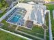 House with screened pool and fenced backyard, aerial view at 1408 Ruthbern Rd, Daytona Beach, FL 32114