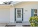 Welcoming front door entry to a bright and airy home at 1408 Ruthbern Rd, Daytona Beach, FL 32114