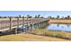 Wooden boardwalk path over water, offering scenic community views at 3161 Paradox Cir # 303, Kissimmee, FL 34746