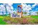 Storey Lake community entrance sign with landscaping at 3161 Paradox Cir # 303, Kissimmee, FL 34746