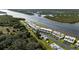 Aerial view of waterfront townhomes and tennis court at 41 Ocean Palm Villa S # 41, Flagler Beach, FL 32136