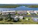 Aerial view of waterfront townhomes and tennis court at 41 Ocean Palm Villa S # 41, Flagler Beach, FL 32136