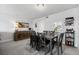 Bright dining room with table and chairs, stylish buffet, and built-in shelving at 41 Ocean Palm Villa S # 41, Flagler Beach, FL 32136