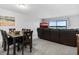 Bright dining area with table, chairs, and view to living room at 41 Ocean Palm Villa S # 41, Flagler Beach, FL 32136