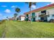 Exterior view of the condo building and landscaping at 41 Ocean Palm Villa S # 41, Flagler Beach, FL 32136