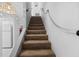 Modern carpeted staircase with rope railing at 41 Ocean Palm Villa S # 41, Flagler Beach, FL 32136