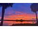 Vibrant sunset over calm water reflecting the colorful sky at 41 Ocean Palm Villa S # 41, Flagler Beach, FL 32136