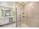 Bathroom features a large walk-in shower and double vanity at 4741 Clock Tower Dr # 105, Kissimmee, FL 34746