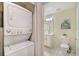 Convenient laundry room with stackable washer and dryer at 4741 Clock Tower Dr # 105, Kissimmee, FL 34746