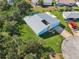 Single story home with metal roof and pool at 6 Baytree Cir, Ormond Beach, FL 32176