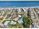 Aerial view of a single-Gathering home near the beach with a pool at 6 Baytree Cir, Ormond Beach, FL 32176