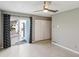 Bedroom with sliding glass door to patio at 6 Baytree Cir, Ormond Beach, FL 32176